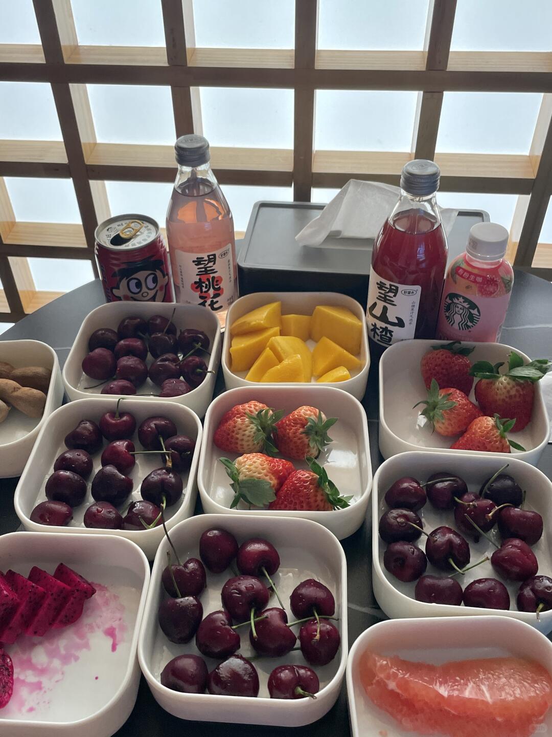Fresh fruit and bottled drinks available at FUFU Bathhouse’s dessert and beverage station.
