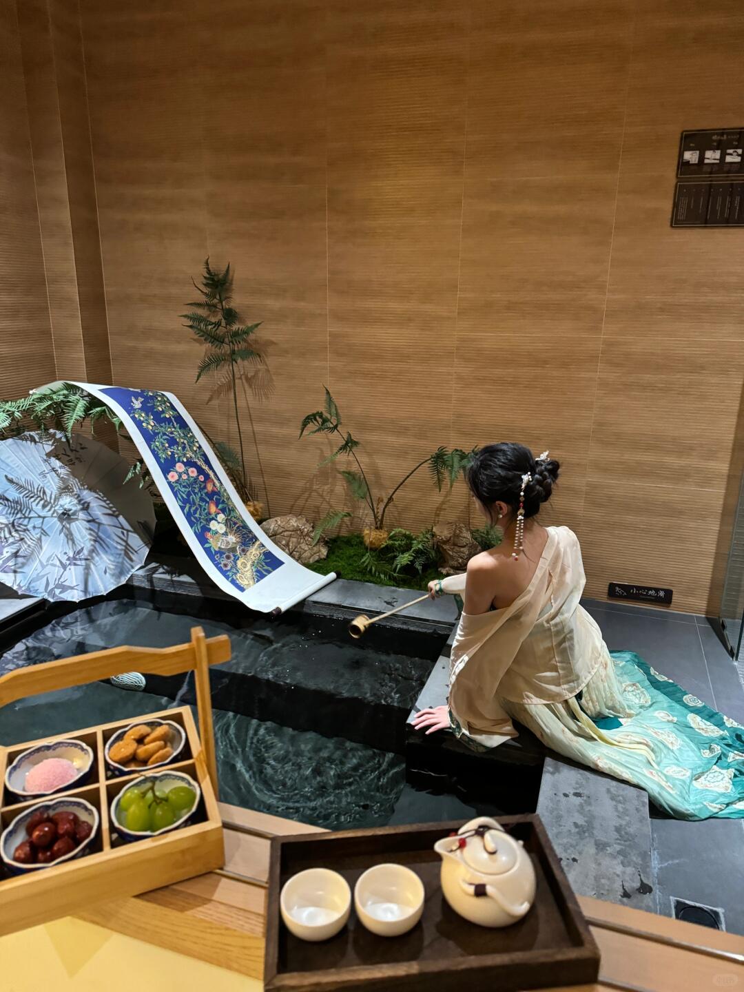 Private hot spring room at Forty Spring Carbonated Onsen featuring a themed photo setup with traditional decor and a relaxing atmosphere.