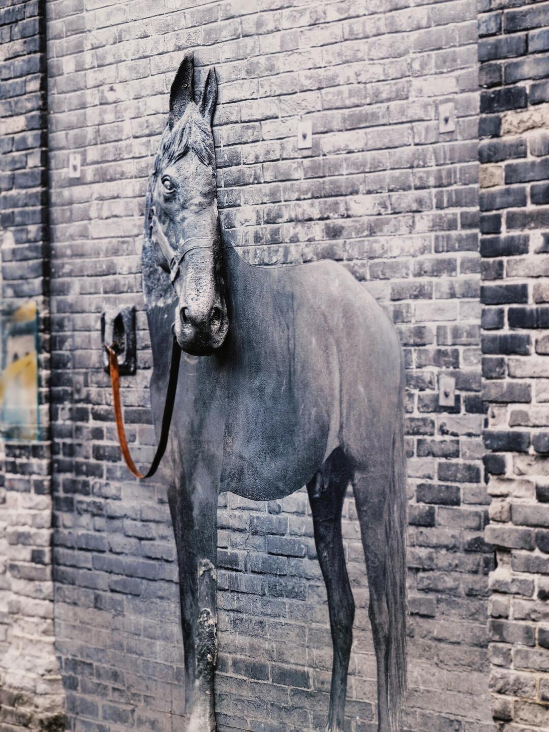 Horse mural on a traditional brick wall in Kuanzhai Alley, Chengdu